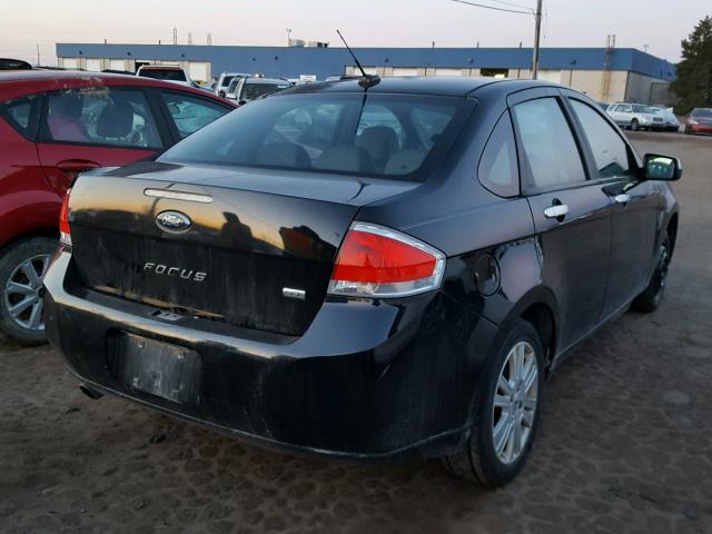 1FAHP3HN1AW256698 - 2010 FORD FOCUS SEL BLACK photo 4