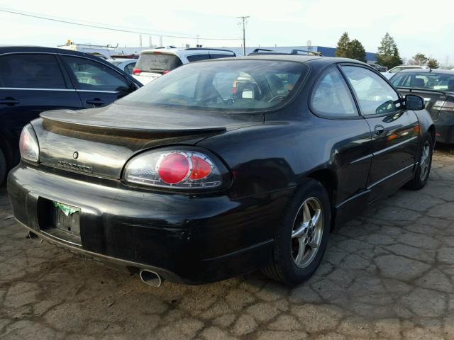 1G2WP12KX2F109175 - 2002 PONTIAC GRAND PRIX BLACK photo 4