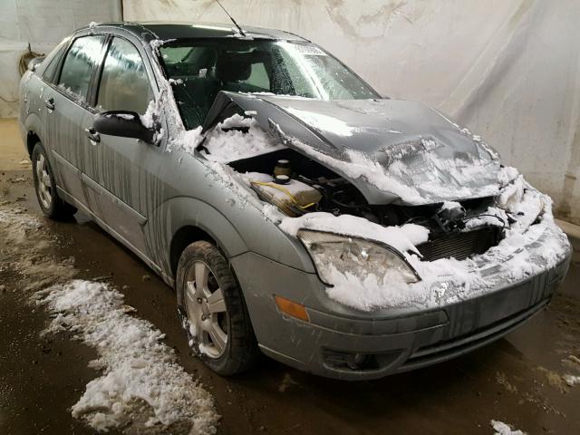 1FAFP34N06W130563 - 2006 FORD FOCUS ZX4 GRAY photo 1