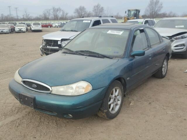 1FAFP66L8WK228602 - 1998 FORD CONTOUR LX GREEN photo 2