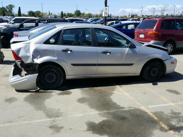 1FAFP33Z34W178348 - 2004 FORD FOCUS LX SILVER photo 9