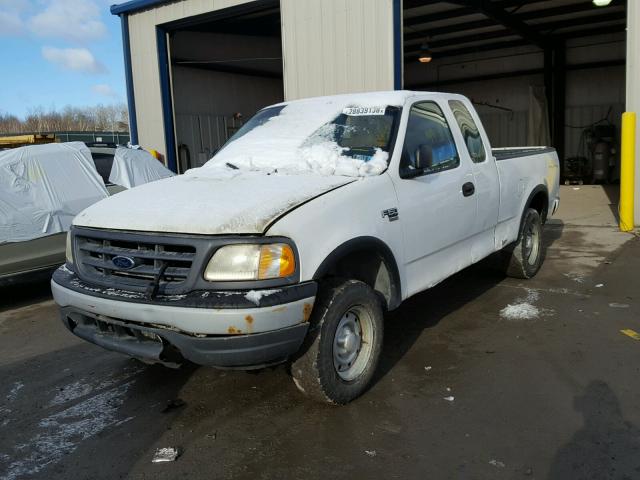 1FTRX18W0YNA57797 - 2000 FORD F150 WHITE photo 2