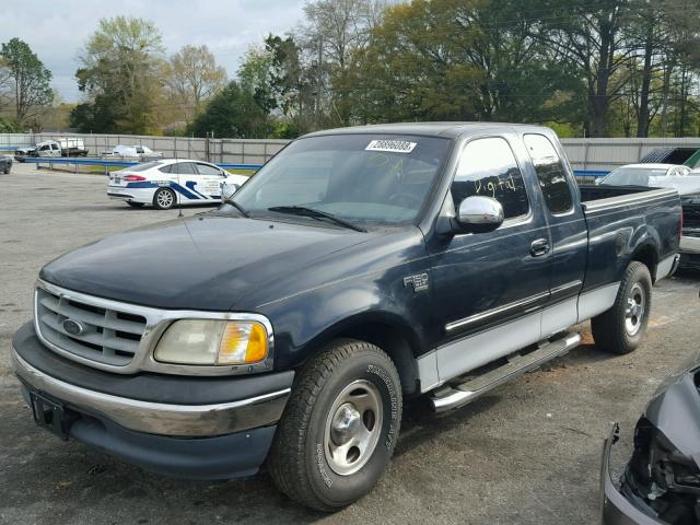 1FTRX17W0YNB70697 - 2000 FORD F150 BLACK photo 2