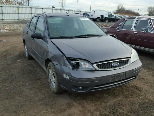 1FAHP34N77W199177 - 2007 FORD FOCUS ZX4 GRAY photo 1