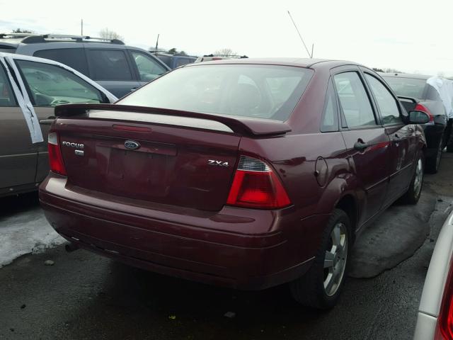 1FAFP34N06W149579 - 2006 FORD FOCUS ZX4 RED photo 4