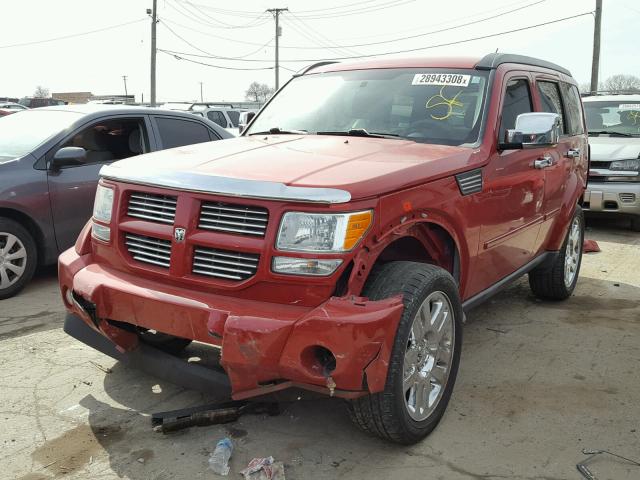 1D4PT4GK1BW605197 - 2011 DODGE NITRO HEAT RED photo 2