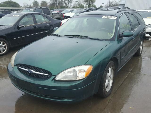 1FAFP5822YG212299 - 2000 FORD TAURUS SE GREEN photo 2