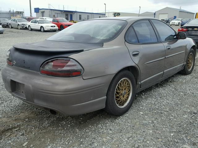 1G2WP52K6YF205563 - 2000 PONTIAC GRAND PRIX BROWN photo 4