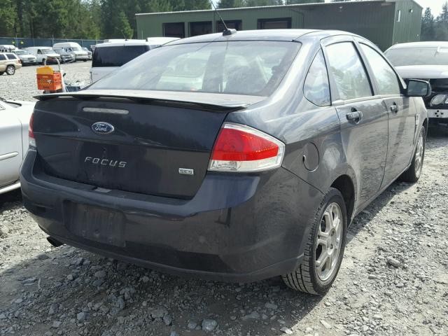 1FAHP35N48W105725 - 2008 FORD FOCUS SE BLACK photo 4