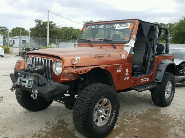 1J4FY19S1XP455528 - 1999 JEEP WRANGLER / ORANGE photo 2