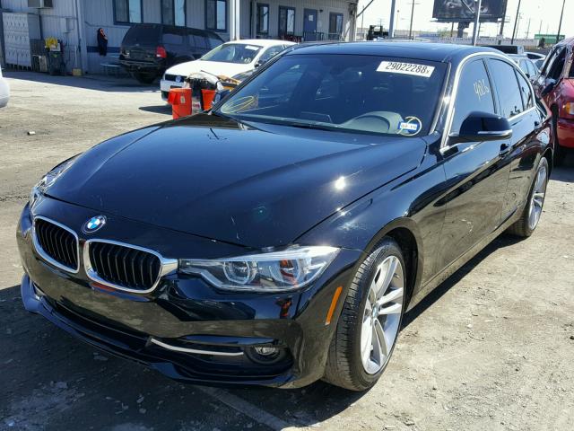 WBA8B9G38HNU55157 - 2017 BMW 330 I BLACK photo 2