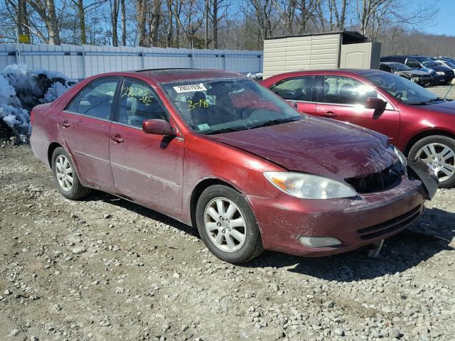 4T1BF30KX3U050939 - 2003 TOYOTA CAMRY LE RED photo 1