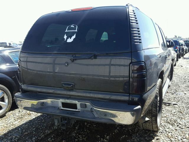 3GNEC16Z22G355864 - 2002 CHEVROLET SUBURBAN C BLACK photo 4