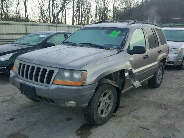 1J4GW58S3XC785813 - 1999 JEEP GRAND CHER BEIGE photo 2