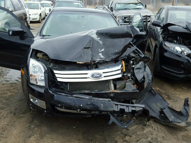 3FAHP07Z28R194776 - 2008 FORD FUSION SE BLACK photo 7