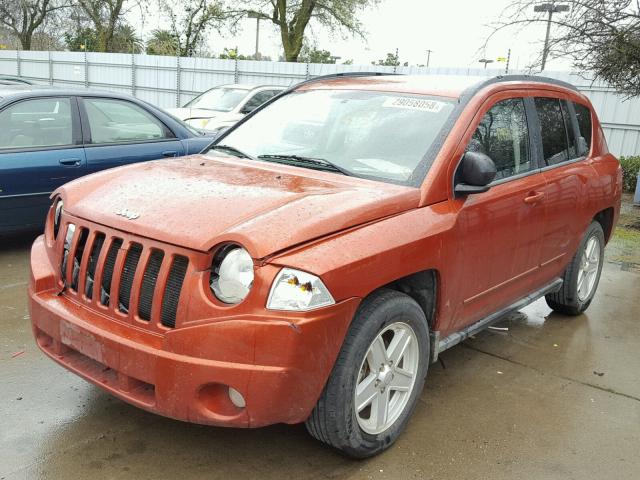 1J4NT4FB7AD578811 - 2010 JEEP COMPASS SP ORANGE photo 2