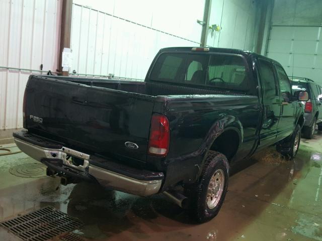 3FTNW21S71MA54779 - 2001 FORD F250 SUPER BLACK photo 4