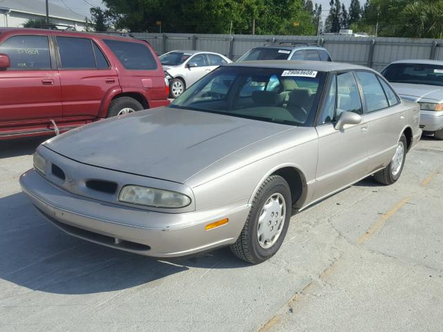 1G3HN52K3V4827457 - 1997 OLDSMOBILE 88 BASE TAN photo 2