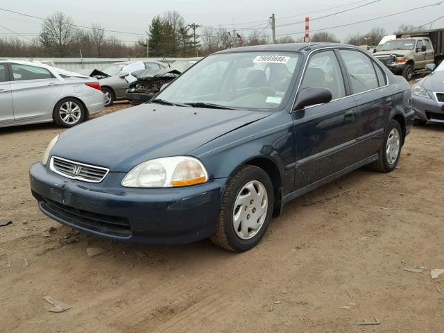 2HGEJ6670VH570885 - 1997 HONDA CIVIC LX GREEN photo 2