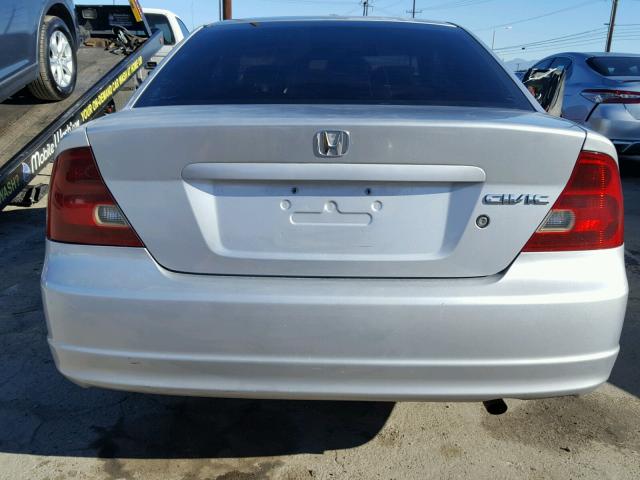 1HGEM22532L010054 - 2002 HONDA CIVIC LX SILVER photo 9