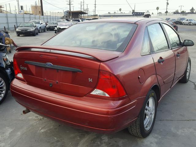 1FAFP3435YW123190 - 2000 FORD FOCUS SE RED photo 4