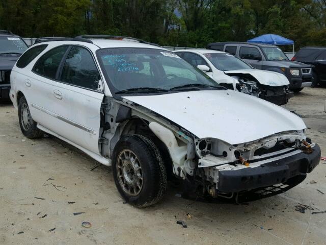 1FAFP58S8XA254588 - 1999 FORD TAURUS SE WHITE photo 1