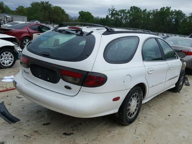 1FAFP58S8XA254588 - 1999 FORD TAURUS SE WHITE photo 4