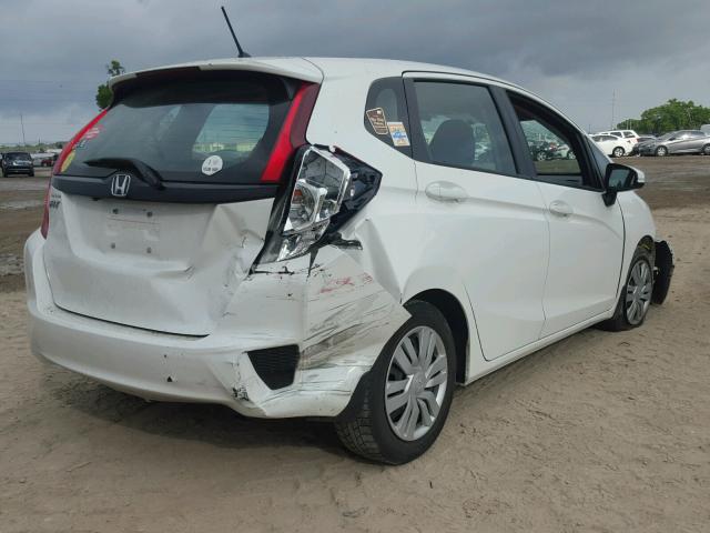 3HGGK5G55FM738939 - 2015 HONDA FIT LX WHITE photo 4