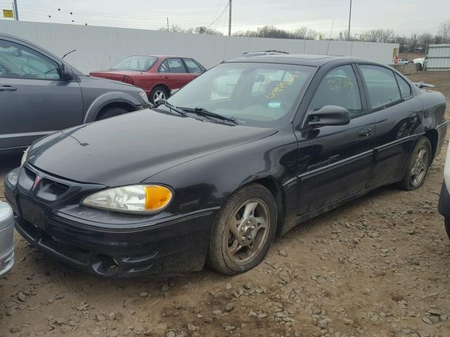 1G2NW52E12M622911 - 2002 PONTIAC GRAND AM G BLACK photo 2