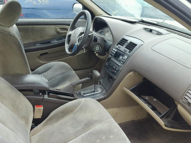 JN1CA31D71T820074 - 2001 NISSAN MAXIMA GXE WHITE photo 5