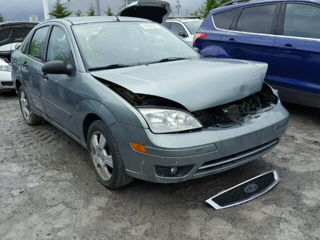 1FAFP34NX6W140310 - 2006 FORD FOCUS ZX4 GRAY photo 1