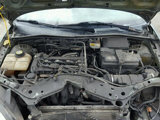 1FAFP34NX6W140310 - 2006 FORD FOCUS ZX4 GRAY photo 7
