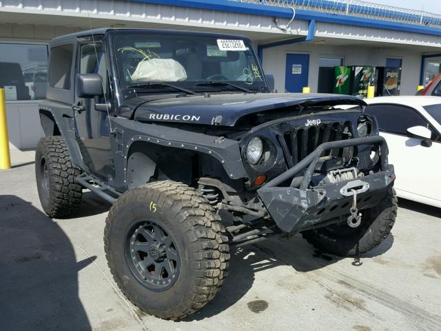 1J4HA6D12BL612265 - 2011 JEEP WRANGLER R BLACK photo 1