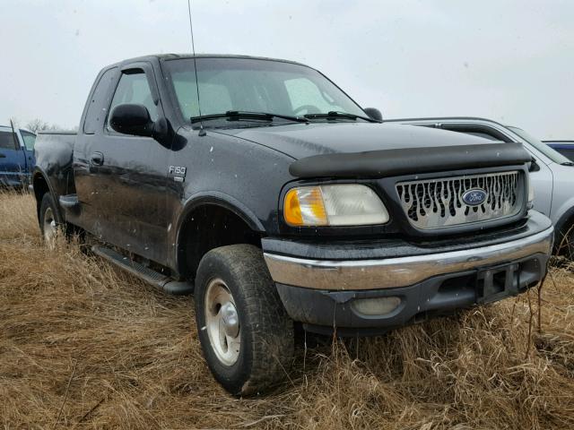 2FTRX08L9YCA73583 - 2000 FORD F150 Черный фото 1