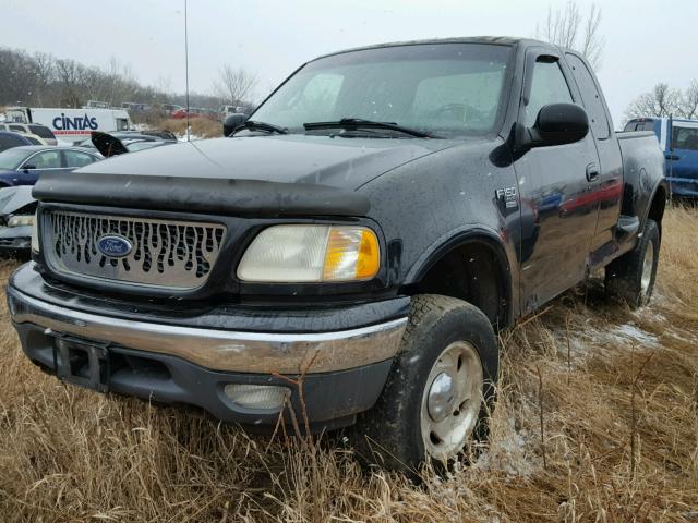 2FTRX08L9YCA73583 - 2000 FORD F150 Черный фото 2
