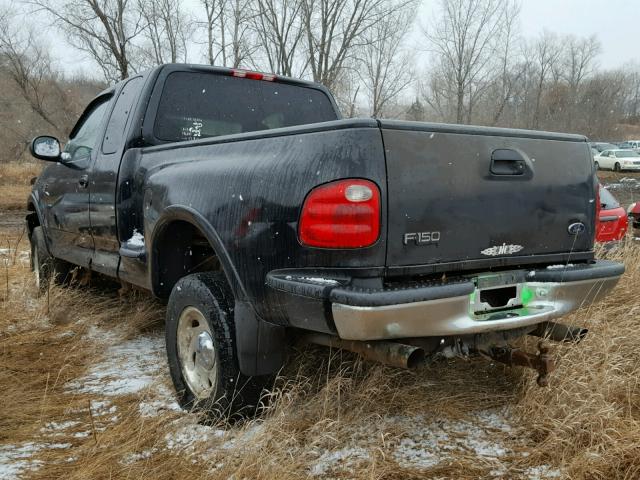2FTRX08L9YCA73583 - 2000 FORD F150 Черный фото 3