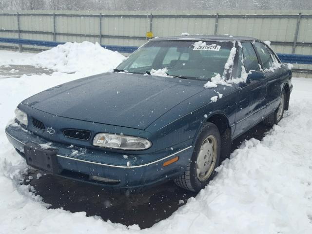 1G3HN52K5V4858449 - 1997 OLDSMOBILE 88 BASE GREEN photo 2