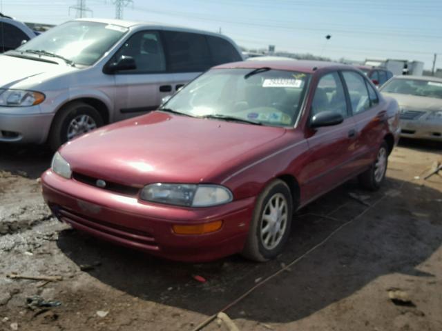 1Y1SK5286SZ049961 - 1995 GEO PRIZM LSI RED photo 2