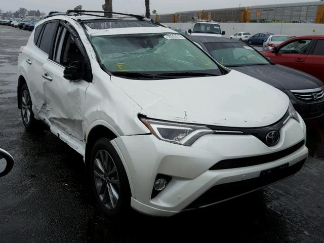 2T3YFREV7HW345222 - 2017 TOYOTA RAV4 LIMIT WHITE photo 1