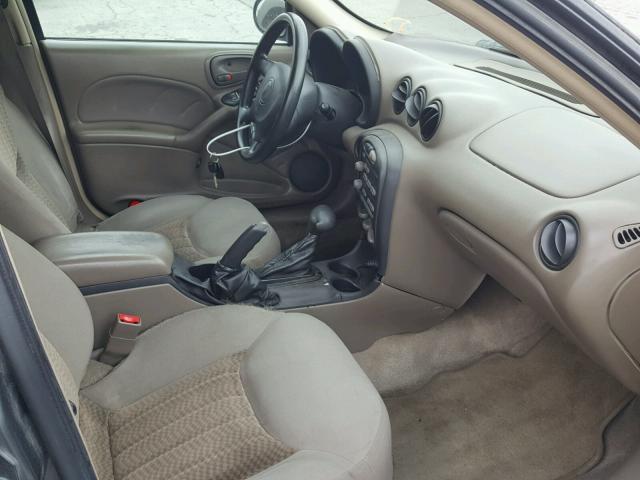1G2NE52E65M111458 - 2005 PONTIAC GRAND AM S ნაცრისფერი ფოტო 5