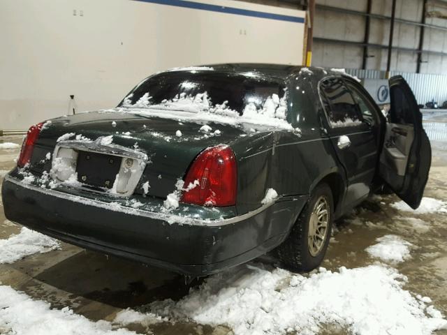 1LNFM82W8XY604322 - 1999 LINCOLN TOWN CAR S GREEN photo 4