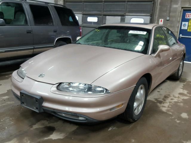 1G3GR62C3X4114818 - 1999 OLDSMOBILE AURORA TAN photo 2