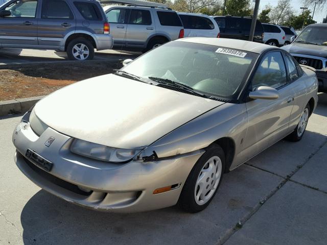 1G8ZY1276XZ313151 - 1999 SATURN SC2 BEIGE photo 2