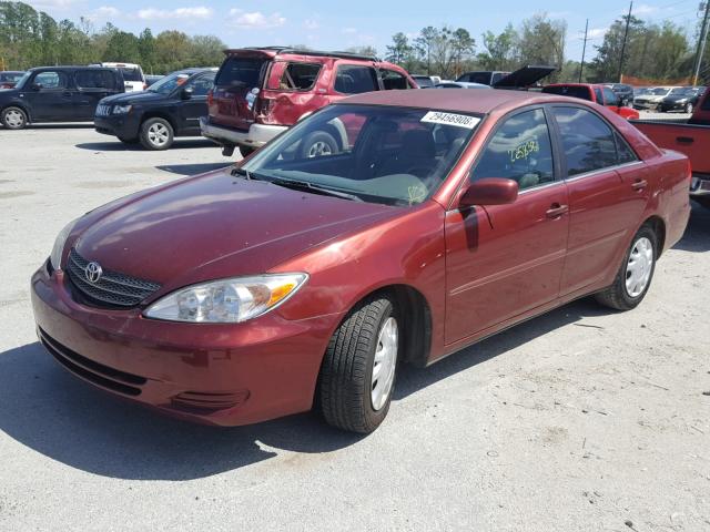 4T1BE32KX2U059560 - 2002 TOYOTA CAMRY LE RED photo 2