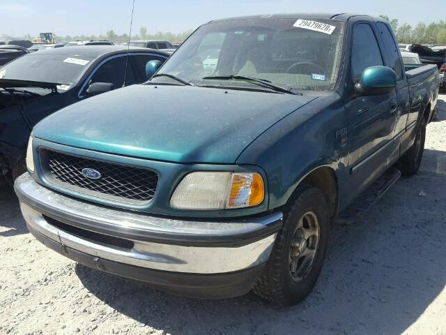 1FTZX1767WKC03063 - 1998 FORD F150 GREEN photo 2