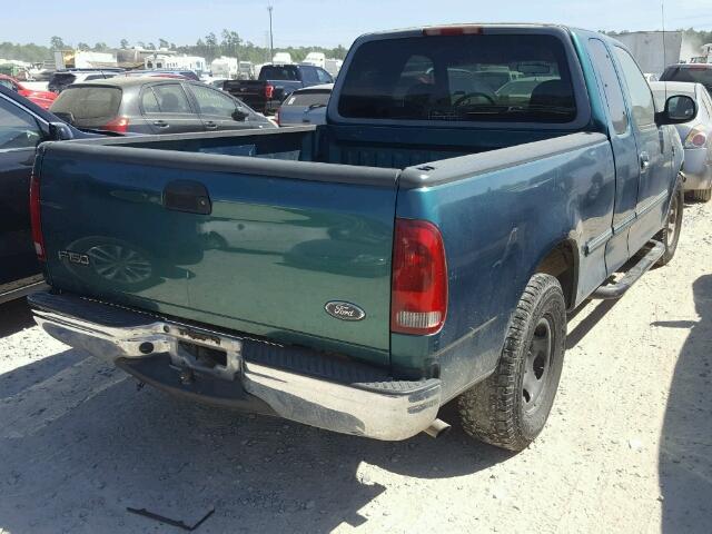 1FTZX1767WKC03063 - 1998 FORD F150 GREEN photo 4