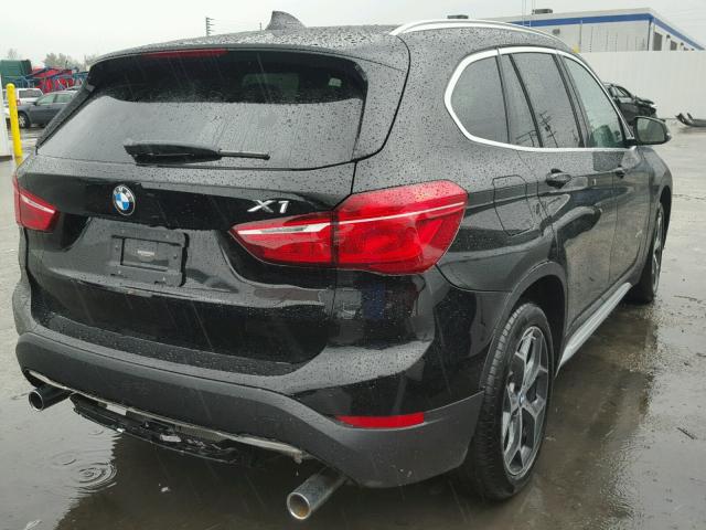 WBXHT3C38J5F90542 - 2018 BMW X1 XDRIVE2 BLACK photo 4