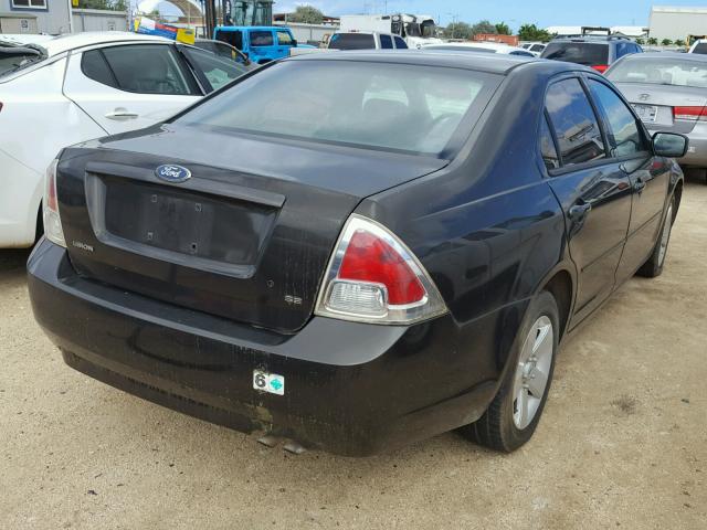 3FAFP07Z26R186519 - 2006 FORD FUSION SE BLACK photo 4