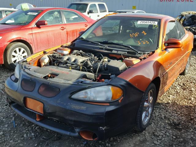 1G2NW12E73C329014 - 2003 PONTIAC GRAND AM G ORANGE photo 2