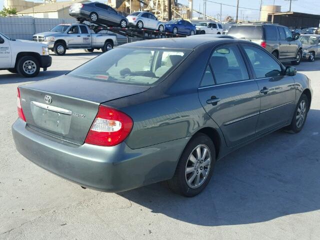 JTDBE30K320051024 - 2002 TOYOTA CAMRY LE GREEN photo 4